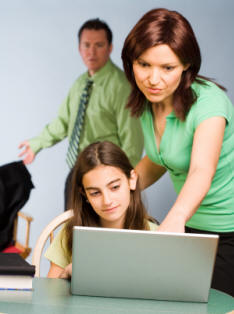 Parent monitoring child's internet surfing for cyber threats
